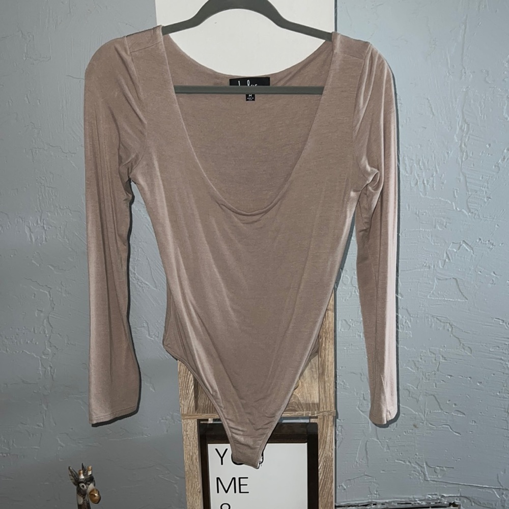 Lulu’s long sleeve thong body suit